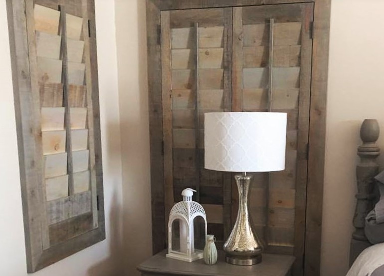 Bluff City bedroom with reclaimed wood shutters.